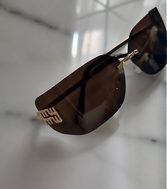 Modern Rimless Miu Miu Sunglasses